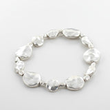 Beaten Disc Bracelet In Silver Plate
