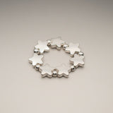 Elasticated Star Ring In Silver Plate