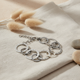 Silver chain bracelet on a white background