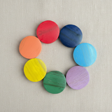 Set of colorful circular objects on a white background