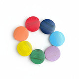 Suzie Blue Canada wooden rainbow bracelet with red, orange, yellow, green, purple, blue, and light blue circular beads.