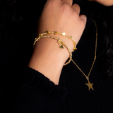 Elasticated Star Charm Bracelet In Gold Plate