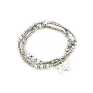 Triple Strand Crystal Bead Bracelet With Charms