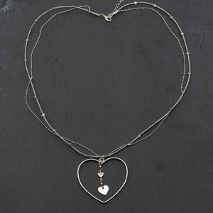 Open Heart Necklace With Heart Drop Charms In Silver Plate