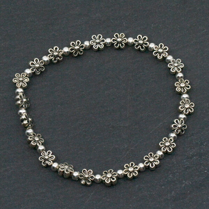Elasticated Flower Bracelet In Silver Plate