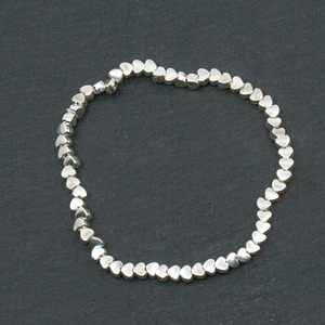 Elasticated Heart Bracelet In Silver Plate