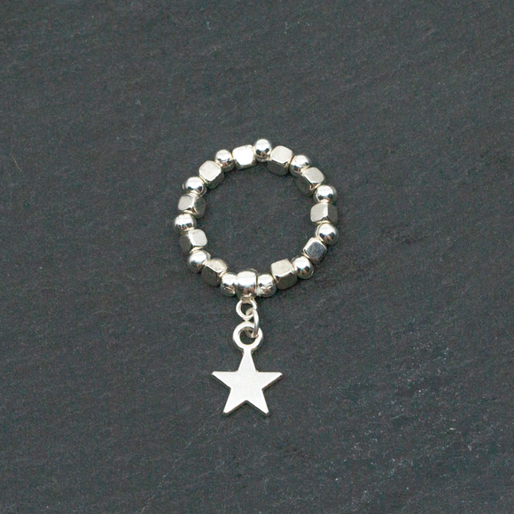 Elasticated Star Charm Ring In Silver Plate